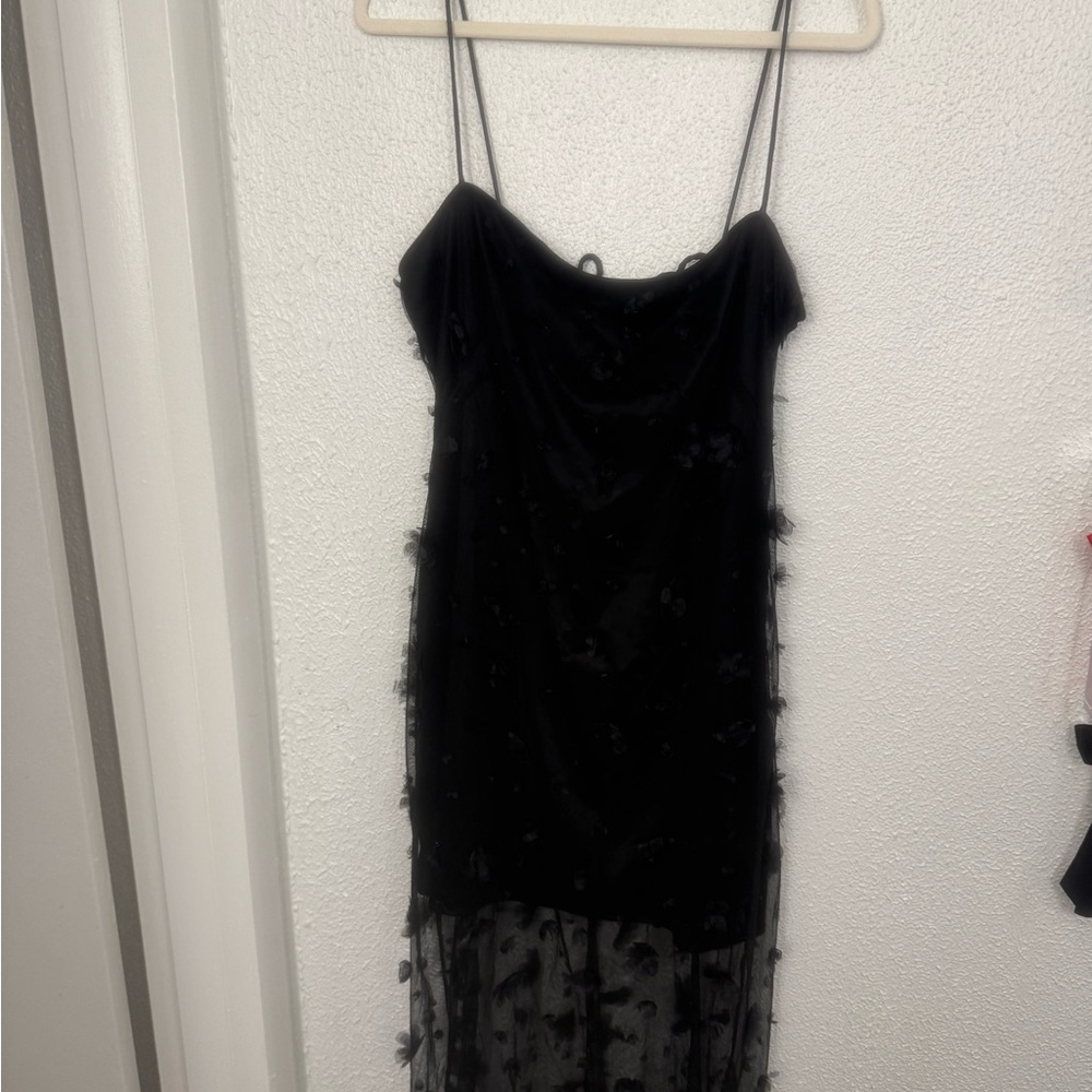 Little black dress with flower sheer detail. By Maeve!